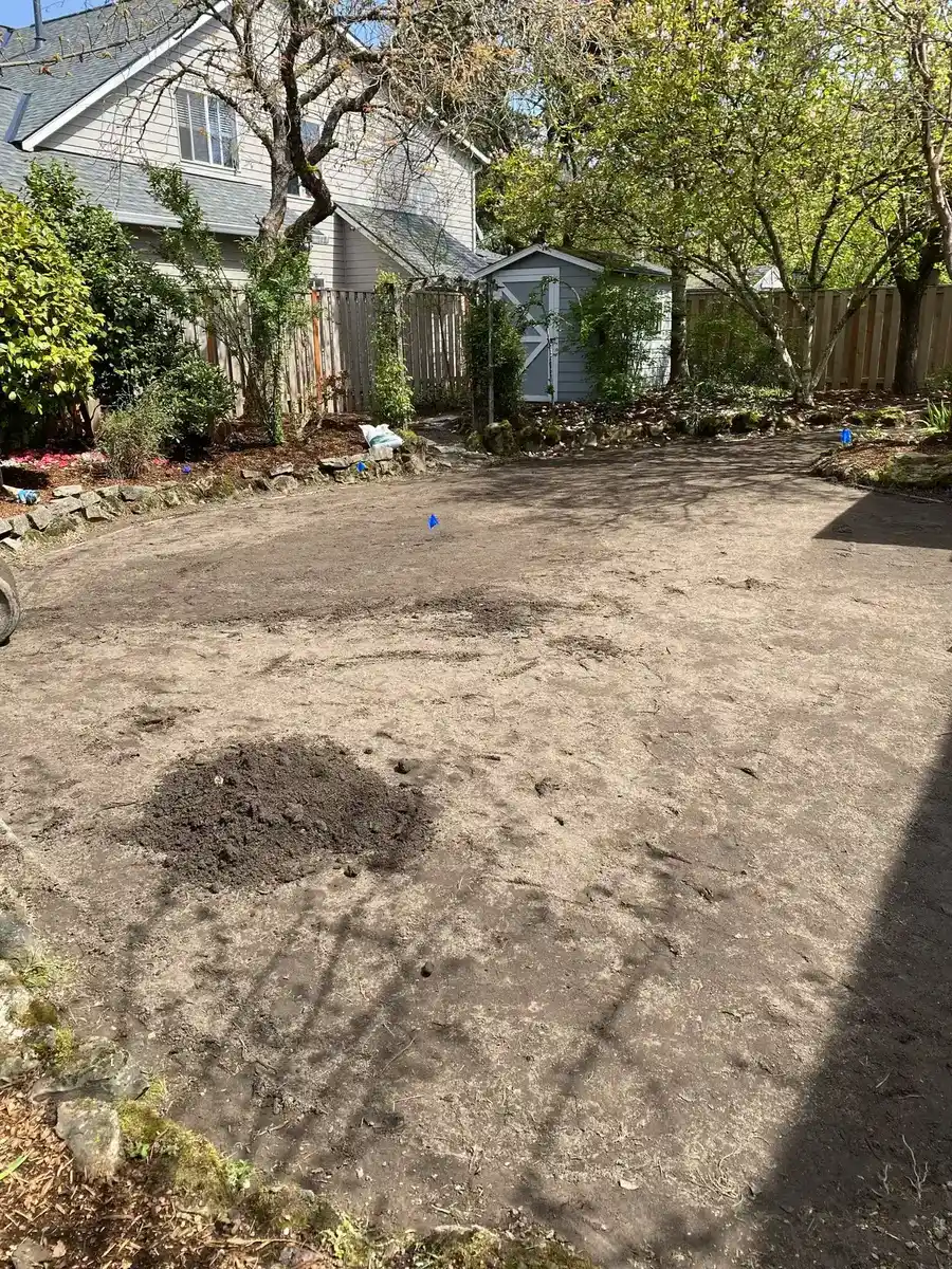 Before photo of bare dirt backyard before CreekView Landscape sod installation