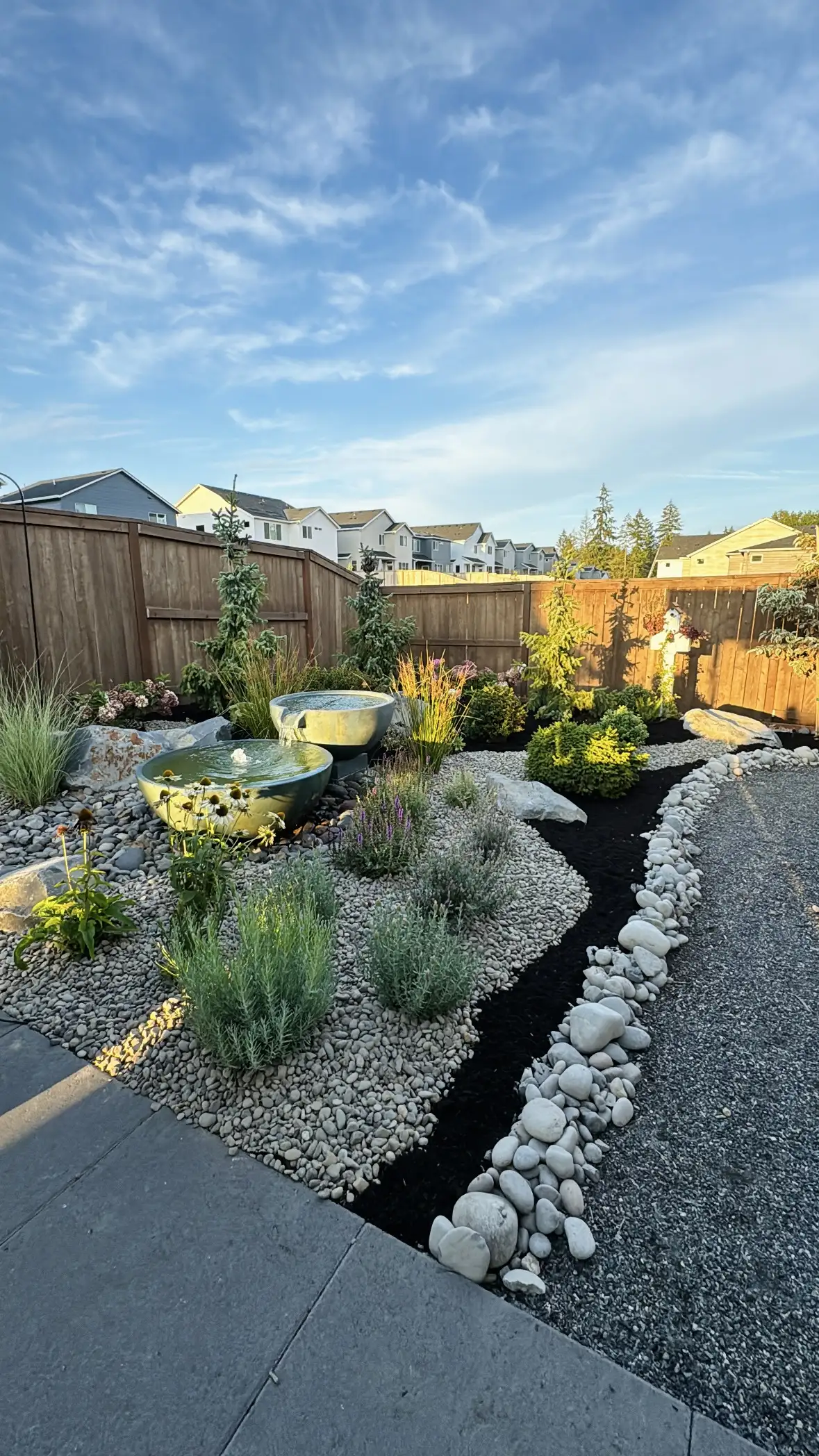 Xeriscape with bowl water feature by CreekView Landscape in Oregon