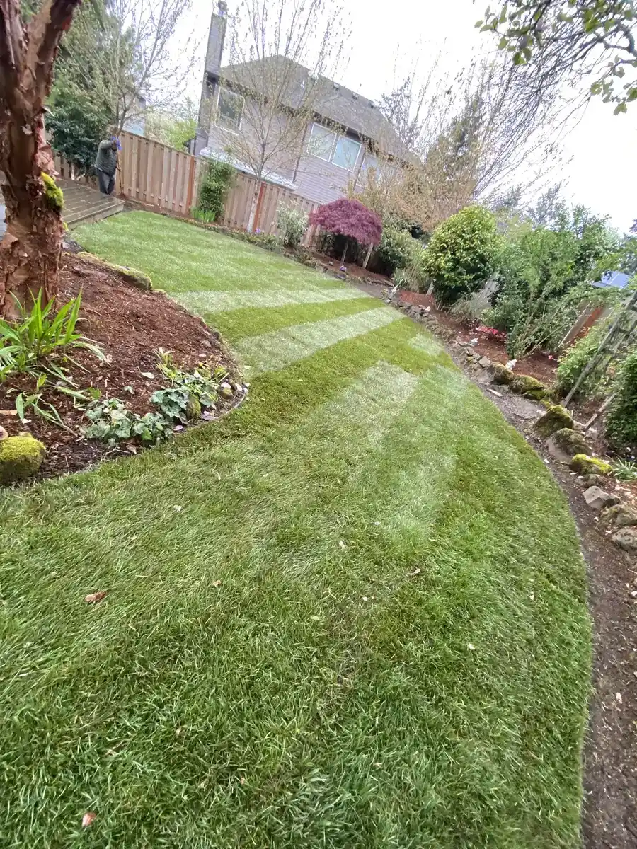 Completed sod and garden bed installation by CreekView Landscape in Oregon